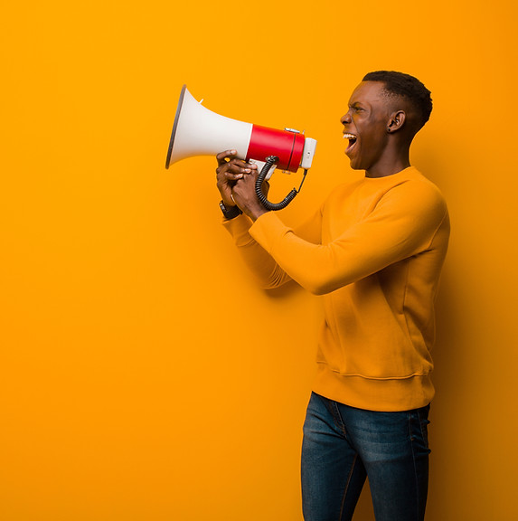 A person calling out through a megaphone